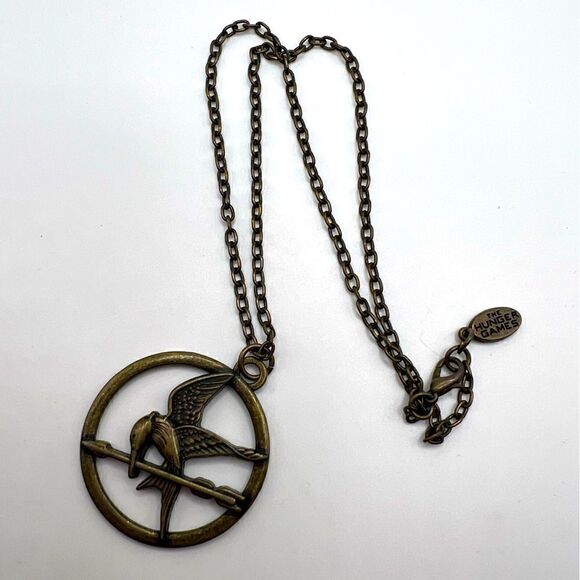 *3/$20* Hunger Games Mockingjay bronze tone necklace - Picture 1 of 3